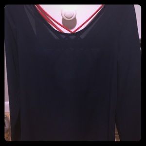 Navy blue long sleeve top w. red crisscrossing